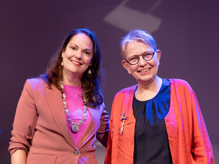 Martina Cornel receives royal honour and honorary membership